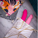 The Collection Embrace Cotton Toy Storage Bag holding colorful items, showcasing discreet storage and stylish design.