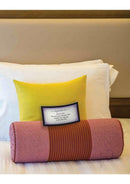Sex Adventures Coupon Book for Couples scenario on a bed with colorful pillows and a playful instruction card.