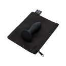 Fifty Shades Of Grey Sensation Vibrating Butt Plug Black on a black pouch.