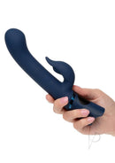 Orgasmatron Digital G-Teaser Silicone Rabbit Blue in a person's hand, showcasing its sleek design and dual functionality.