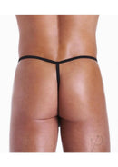 Fundies Referee G String With Whistle OS Black White showcased from the back view, highlighting its daring design.