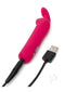 Happy Rabbit clitoral vibrator in vibrant pink with USB charging cable attached for enhanced pleasure.
