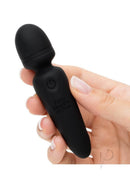 Fifty Shades of Grey Sensation Recharge Mini Wand in hand, showcasing sleek silicone design and ergonomic shape.