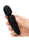Fifty Shades of Grey Sensation Recharge Mini Wand in hand, showcasing sleek silicone design and ergonomic shape.