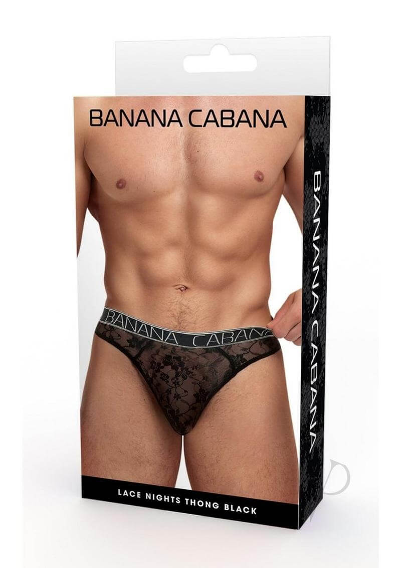 Banana Cabana Lace Nights Thong Medium Large Black packaging displayed on a model showcasing its design and fit.