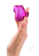 Love to Love Kisscool Small Finger Vibrator Berry showcased on a hand, emphasizing its compact and discreet design.