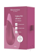 Womanizer Vibe Dusky Pink packaging showcasing noiseless clitoral vibrator with UltraWave Vibration technology.