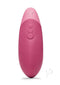 Dusky pink Womanizer Vibe clitoral vibrator with UltraWave Vibration technology and ergonomic design for enhanced pleasure.