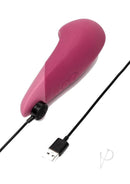 Dusky pink Womanizer Vibe clitoral vibrator with UltraWave technology and USB charging cable.