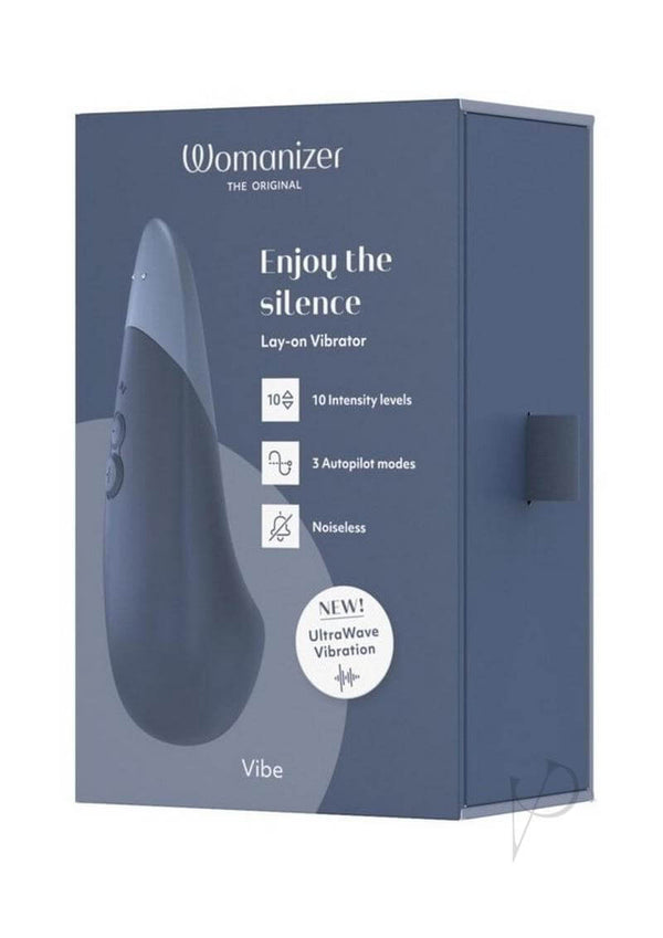 Womanizer Vibe Dark Blue packaging, featuring a silent clitoral vibrator with UltraWave Vibration technology.