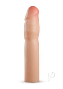 Performance Plus 1.5 Inch Silicone Penis Extender Vanilla viewed from the side on a white background.