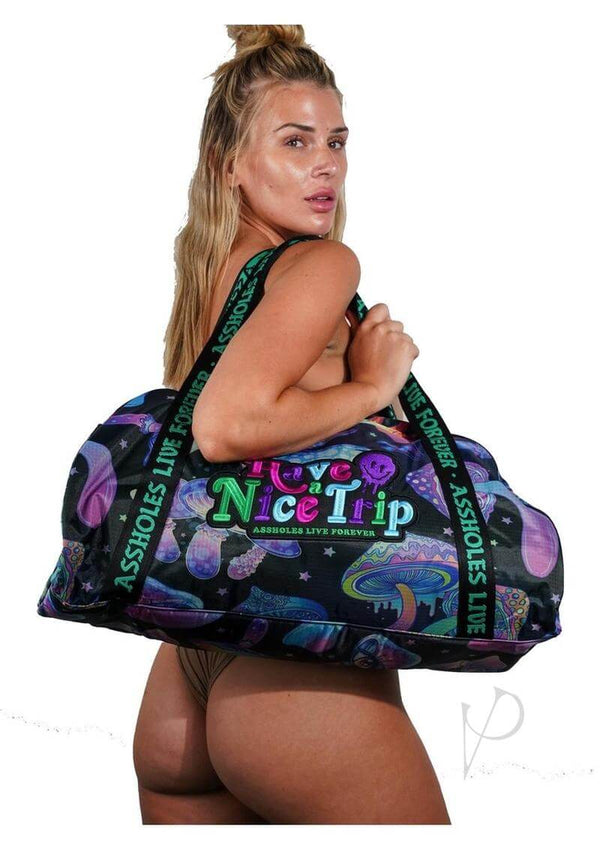 Multi-colored "Have A Nice Trip" duffle bag with vibrant designs, promoting a bold and fun travel vibe.