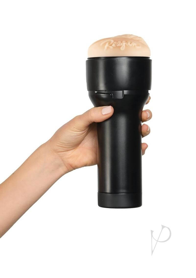 Hand holding Feel Reagan Foxx Stroker from Kiiroo Stars Collection