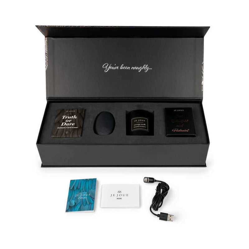 Je Joue The Naughty Collection 4 Piece Gift Set presented in a stylish black box with seductive items inside.
