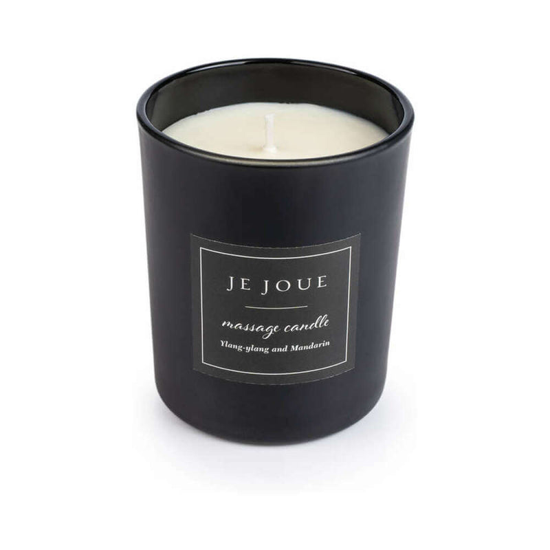 Je Joue The Naughty Collection 4 Piece Gift Set massage candle in black container with Ylang-Ylang and Mandarin scent.