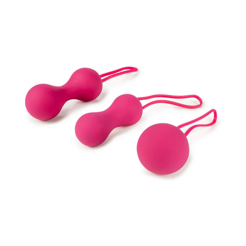 Je Joue The Naughty and Nice Collection, featuring three vibrantly pink pleasure balls in various shapes.