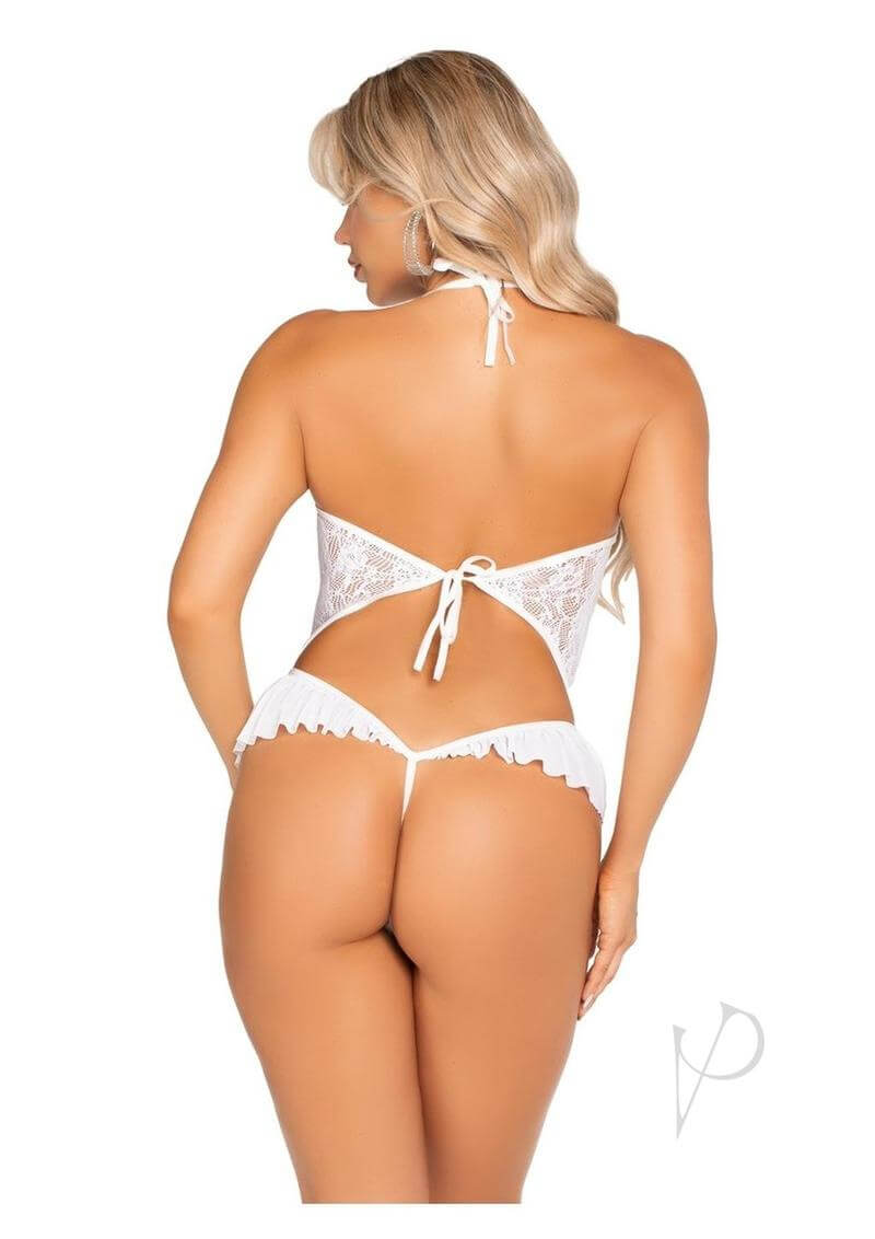 Back view of a model in a Floral Lace Halter Bodysuit with Mini Bow in white, showcasing the lace and ruffle details.