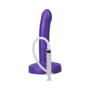 Tantus Pop Slim Squirting Dildo Indiglow with syringe, designed for realistic ejaculation play.