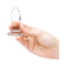 Person holding a b-Vibe 4 Piece Anal Dilators Glass Plug Set glass plug, showcasing its sleek design and body-safe material.