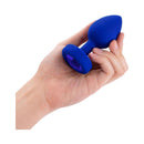 b-Vibe Vibrating Jewel Remote Controlled Anal Plug L XL in hand showcasing its sleek blue design and jeweled base.
