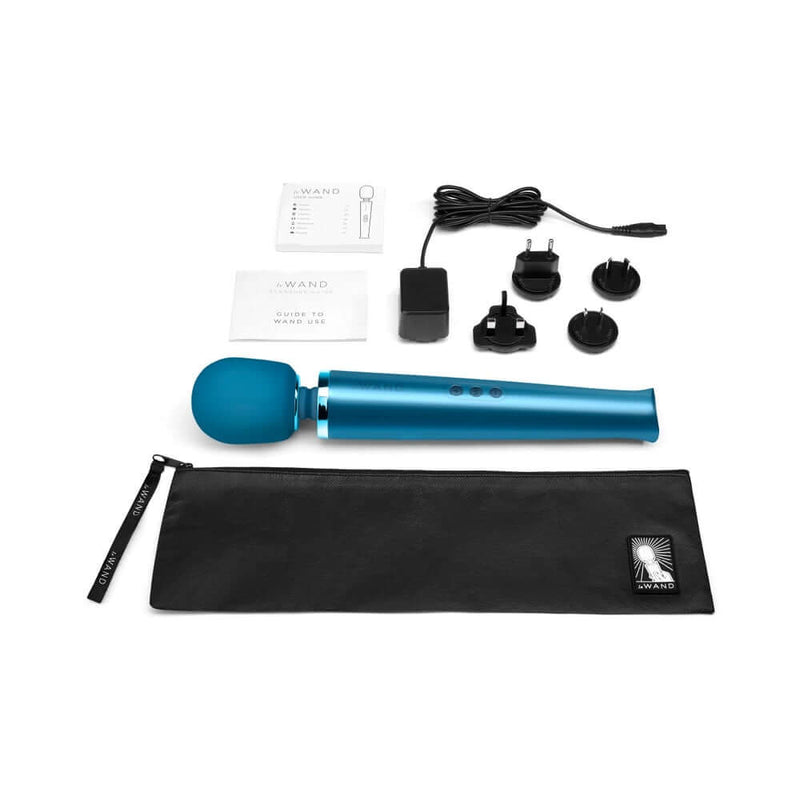 Le Wand Rechargeable Vibrating Massager Pacific Blue with accessories and charging cords.