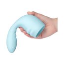 Le Wand Flexi Posable Silicone Attachment in a hand, showcasing its flexible and textured design.