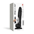Strap-On-Me Sliding Skin Realistic Dildo Black Medium packaging showcasing the dual-density silicone design and realistic details.