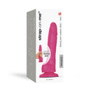 Strap-On-Me Sliding Skin Small Realistic Dildo Fuchsia in packaging showcasing its dual-density design.