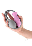 Inya InflataPlay Silicone Inflatable Anal Plug Pink held in hand with pump, showcasing its flexible design.