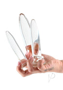 Crystal Trainer Glass Anal Plugs Kit 3 Piece Set Clear held in hand, showcasing elegant design and quality glass craftsmanship.