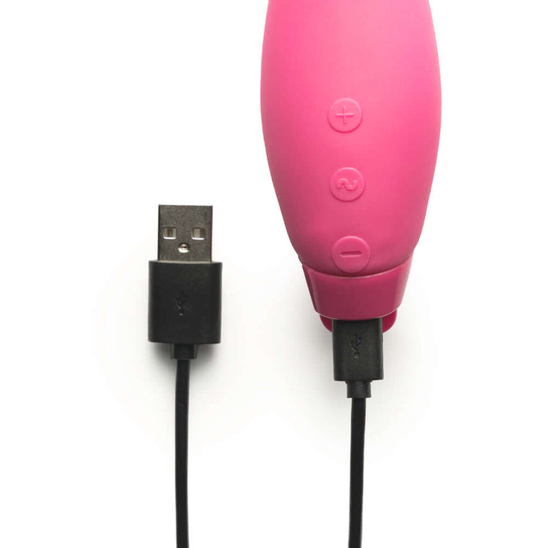 Je Joue Hera Rechargeable Silicone Rabbit Vibrator Fuchsia with USB charging cable connected.