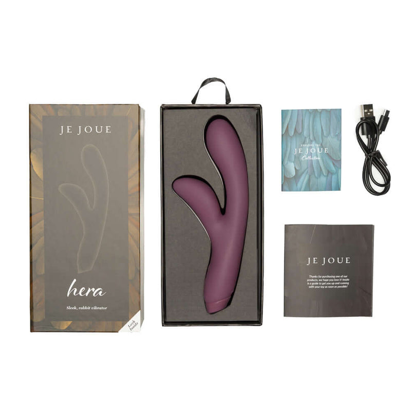 Je Joue Hera Rechargeable Silicone Rabbit Vibrator Purple in its packaging with accessories.