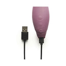 Je Joue Juno Rechargeable Silicone G-Spot Vibrator Purple charging with USB cable.