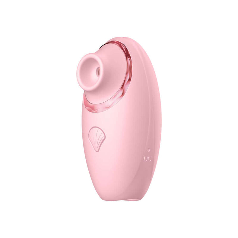 Luv Inc Triple Action Clitoral Vibrator Pink showcasing its compact design and suction tip for intense stimulation.