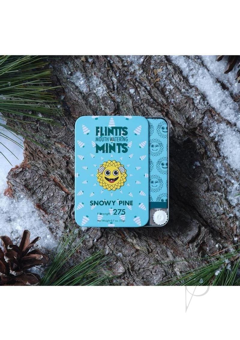 Flintts Mints Mouth Watering Oral Delights Snowy Pine tin on snowy pine branches.
