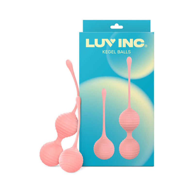 Luv Inc Kegel Balls Ribbed Silicone 2 Piece Set Light Pink in packaging on blue background.