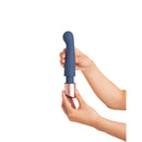 Deia The Couple G Spot and Bullet Massager Silicone Blue held in hand, showcasing its elegant design and functionality.
