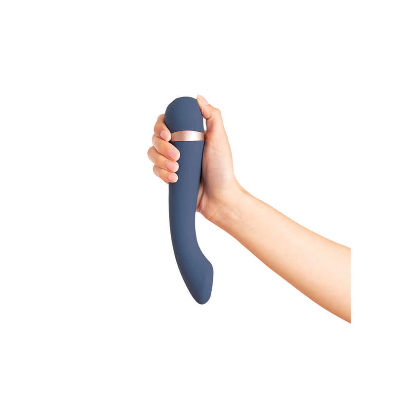 Deia The Hot Cold Temperature Changing G Spot Massager Blue held in hand, featuring sleek design and comfortable grip.