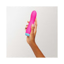 FemmeFunn Rora Rotating Bullet Vibrator Pink held in hand against a light background.