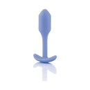 B-Vibe Snug Plug 1 Weighted Silicone Anal Plug Violet displayed on a reflective surface.