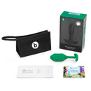 B-vibe Snug Plug 2 Weighted Silicone Anal Plug Green with packaging and accessories displayed.