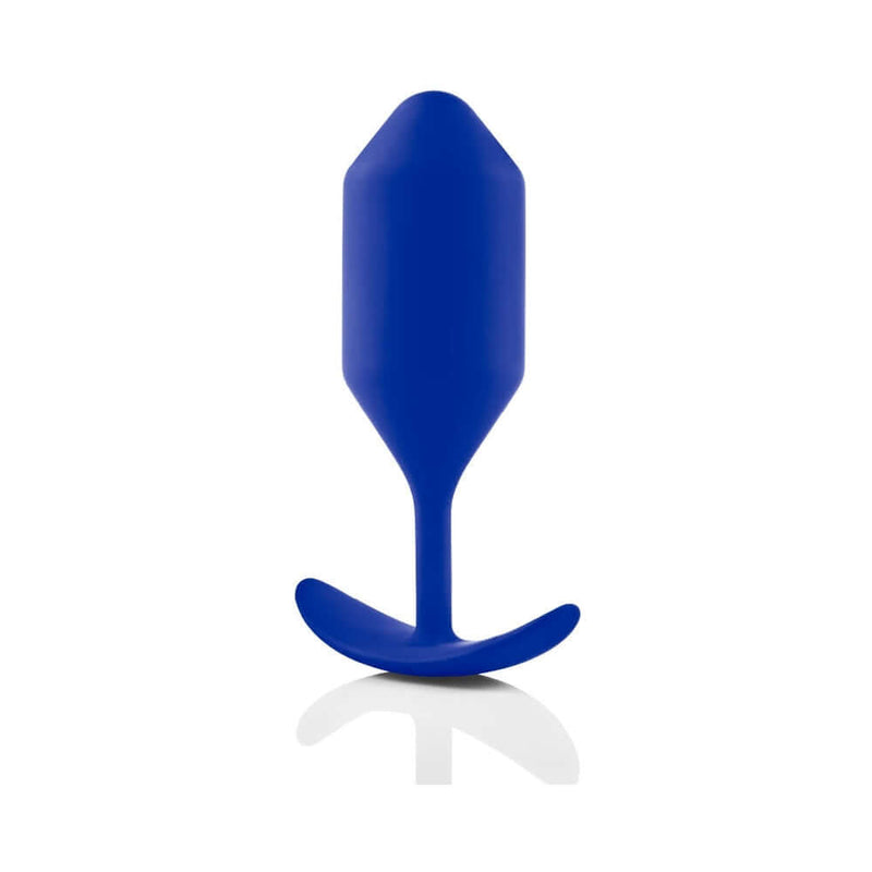b-Vibe Snug Plug 4 Weighted Silicone Anal Plug Navy displayed against a white background.