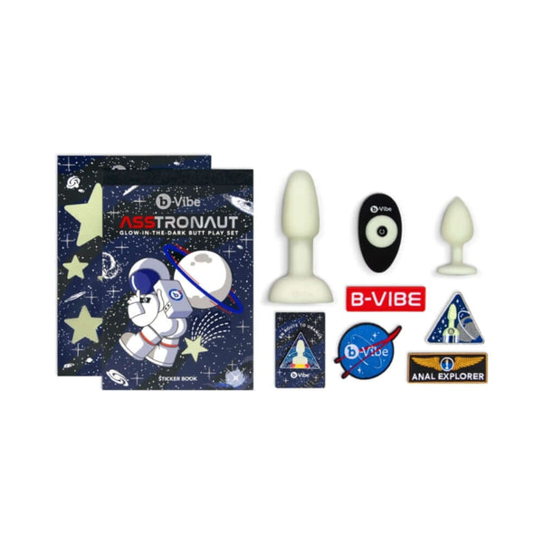 b Vibe 10 Piece Asstronaut Glow in the Dark Butt Play Set with plugs and stickers, including instruction book.