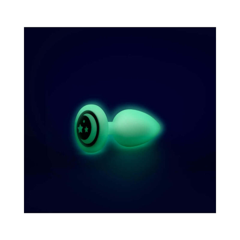b Vibe 10 Piece Asstronaut Glow in the Dark Butt Play Set - glowing anal plug with star design.