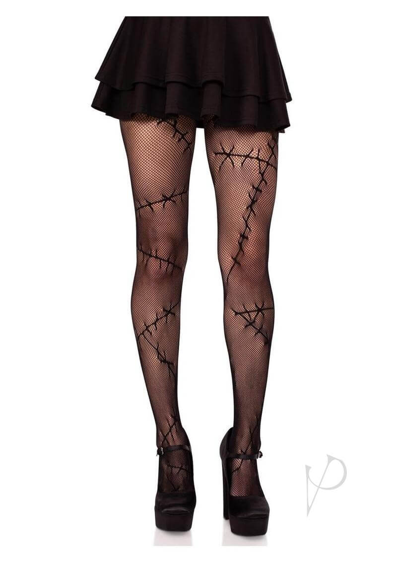 Black net tights with stitched design, worn with a black skirt and high heels, perfect for a stylish and edgy look.