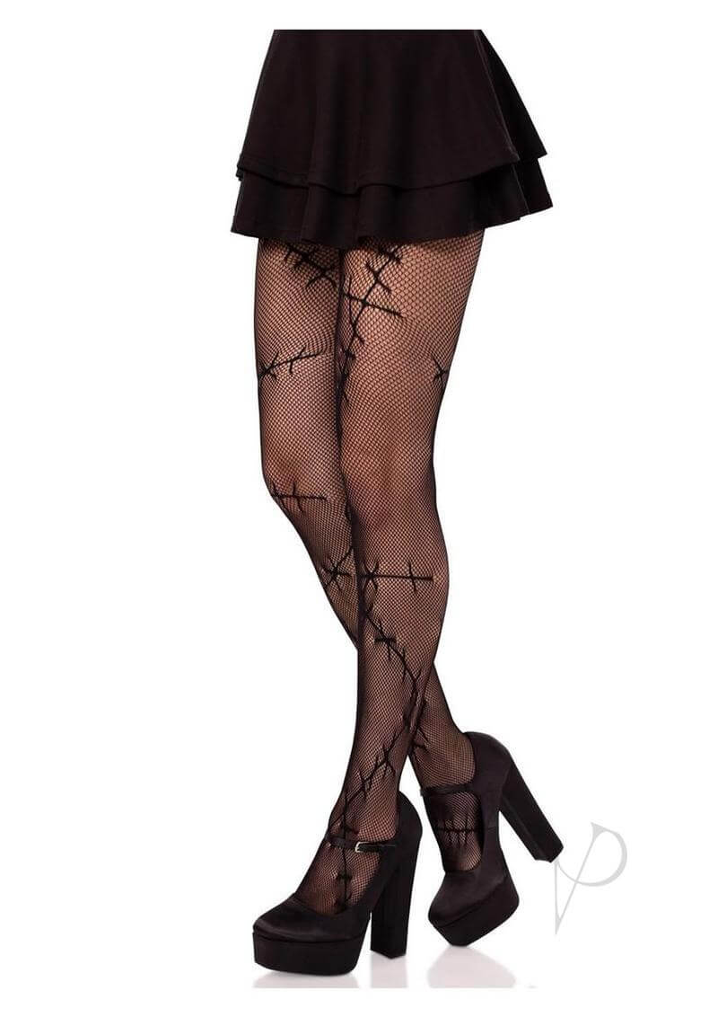 Leg Avenue Stiched Up Net Tights in black worn with a short skirt and high heels, showcasing a bold, stylish look.