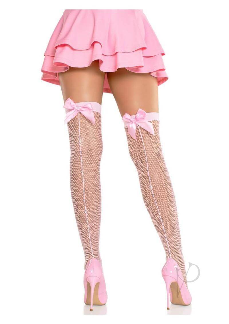 Leg Avenue Satin Bow Fishnet Thigh Highs in pink, worn with a pink skirt, perfect for romantic occasions and stylish lingerie.