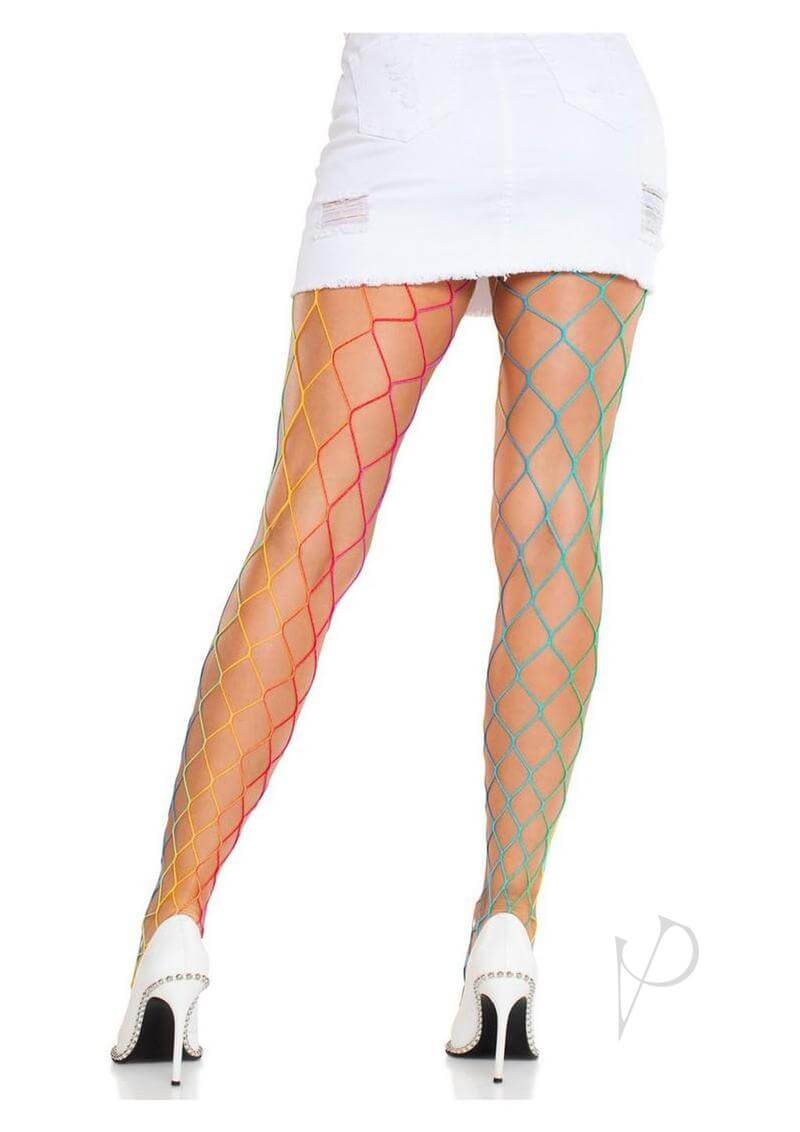 Model wearing multicolor Leg Avenue Rainbow Fence Net Tights with white mini skirt and high heels.