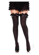 Elegant black thigh high stockings with lace garter and satin bow accent, paired with stylish heels.