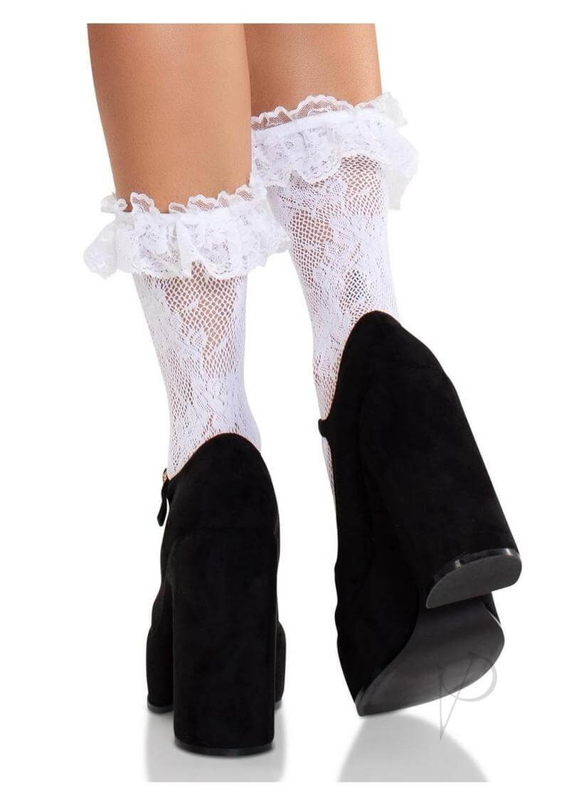 White floral lace ruffle top anklets paired with chic black high heels for a stylish look.
